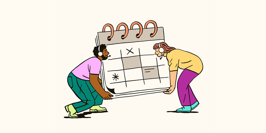 Two people wearing headsets are lifting a giant calendar, showing how teams can balance content management and knowledge management.