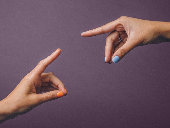 Hands touching