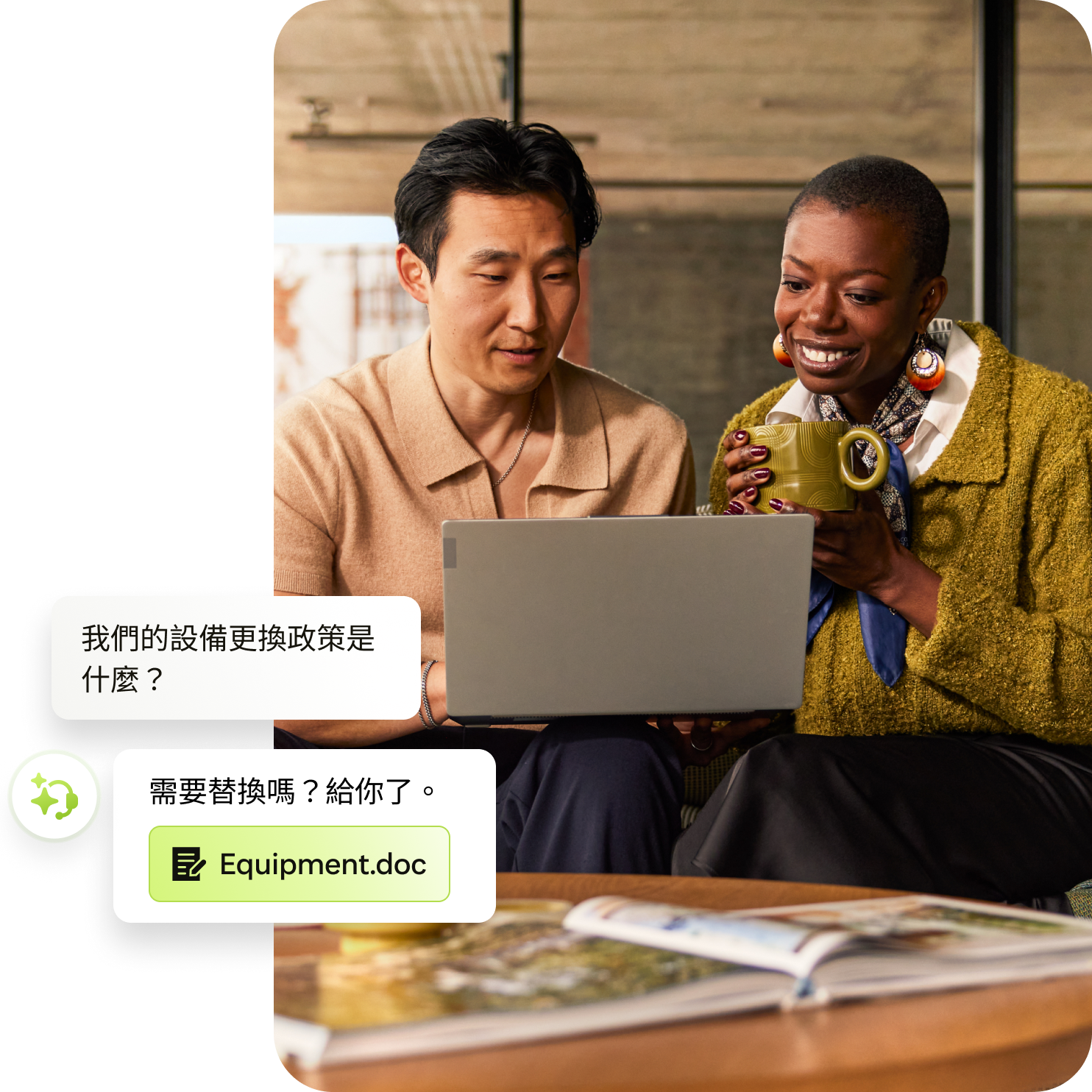 兩位同事坐在手提電腦前
